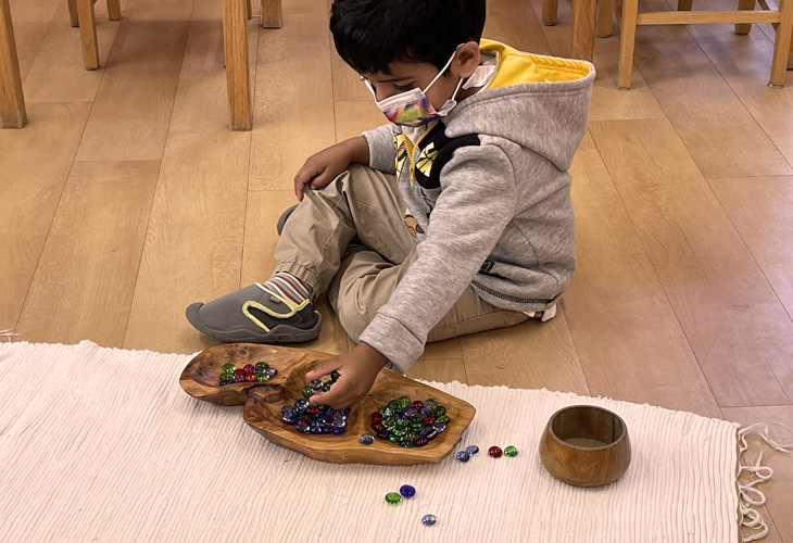 A child learning at Bedford Montessori School